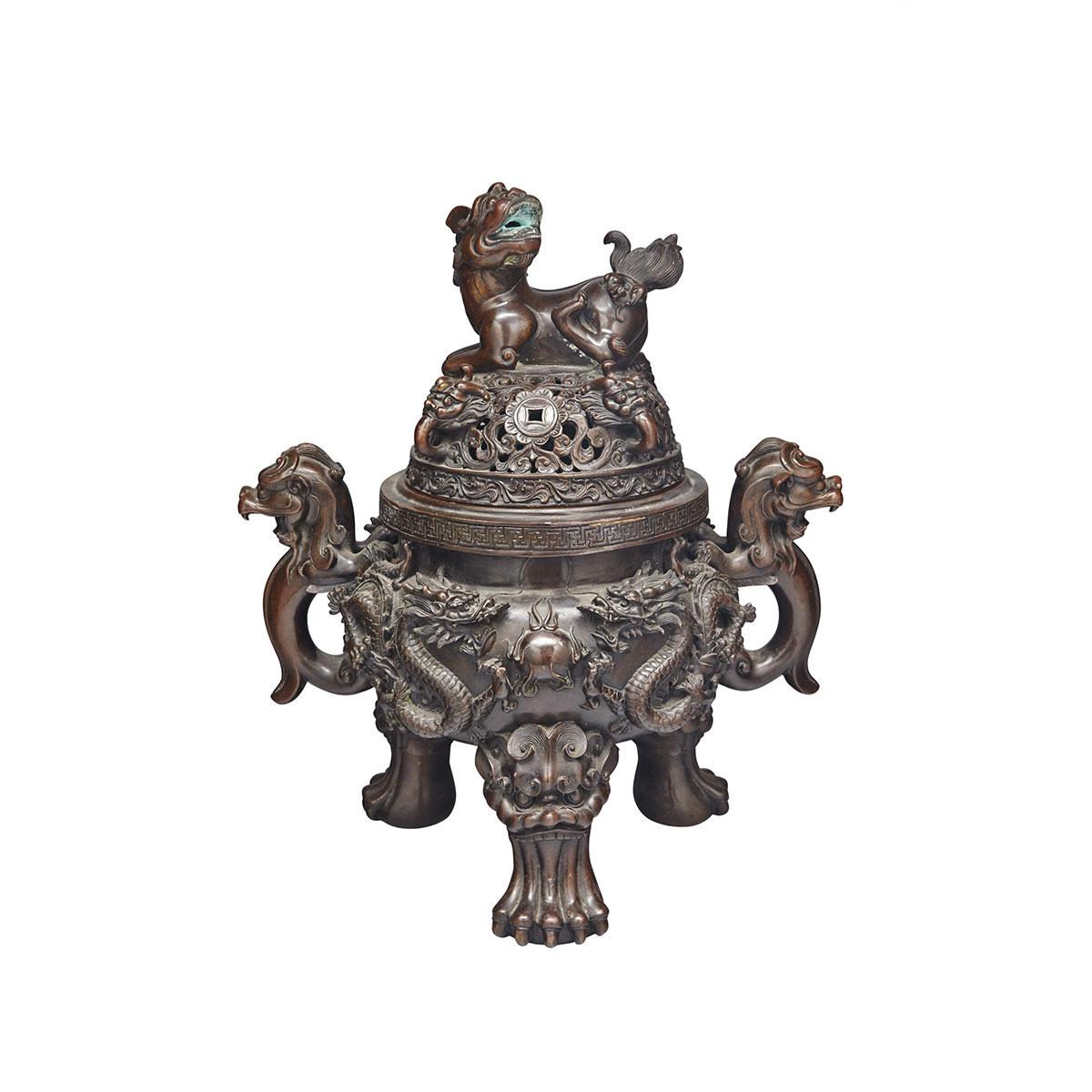 Large Bronze ‘Dragon and Fu-Lion’ Tripod Censer, Xuande Mark, 19th/20th Century