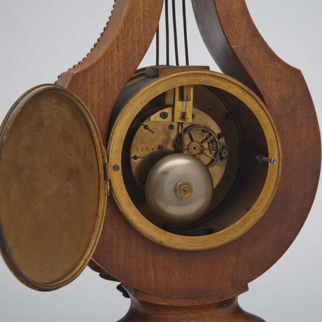 French Ormolu Mounted Mahogany Lyre Form Mantle Clock, 19th century