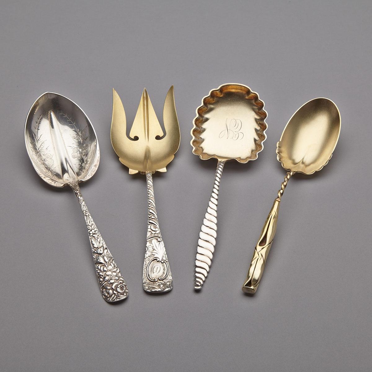 Three American Silver Berry Spoons and a Serving Fork, various makers, c.1900