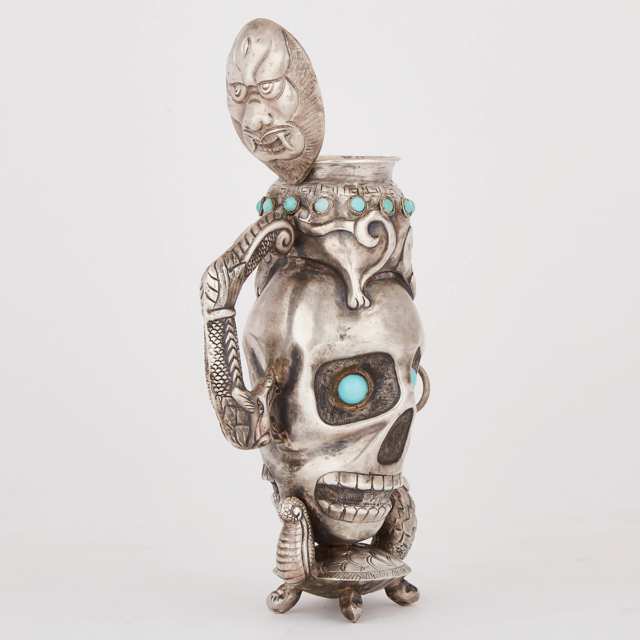 Indonesian Turquoise Inset Silver Skull Form Jug, early 20th century