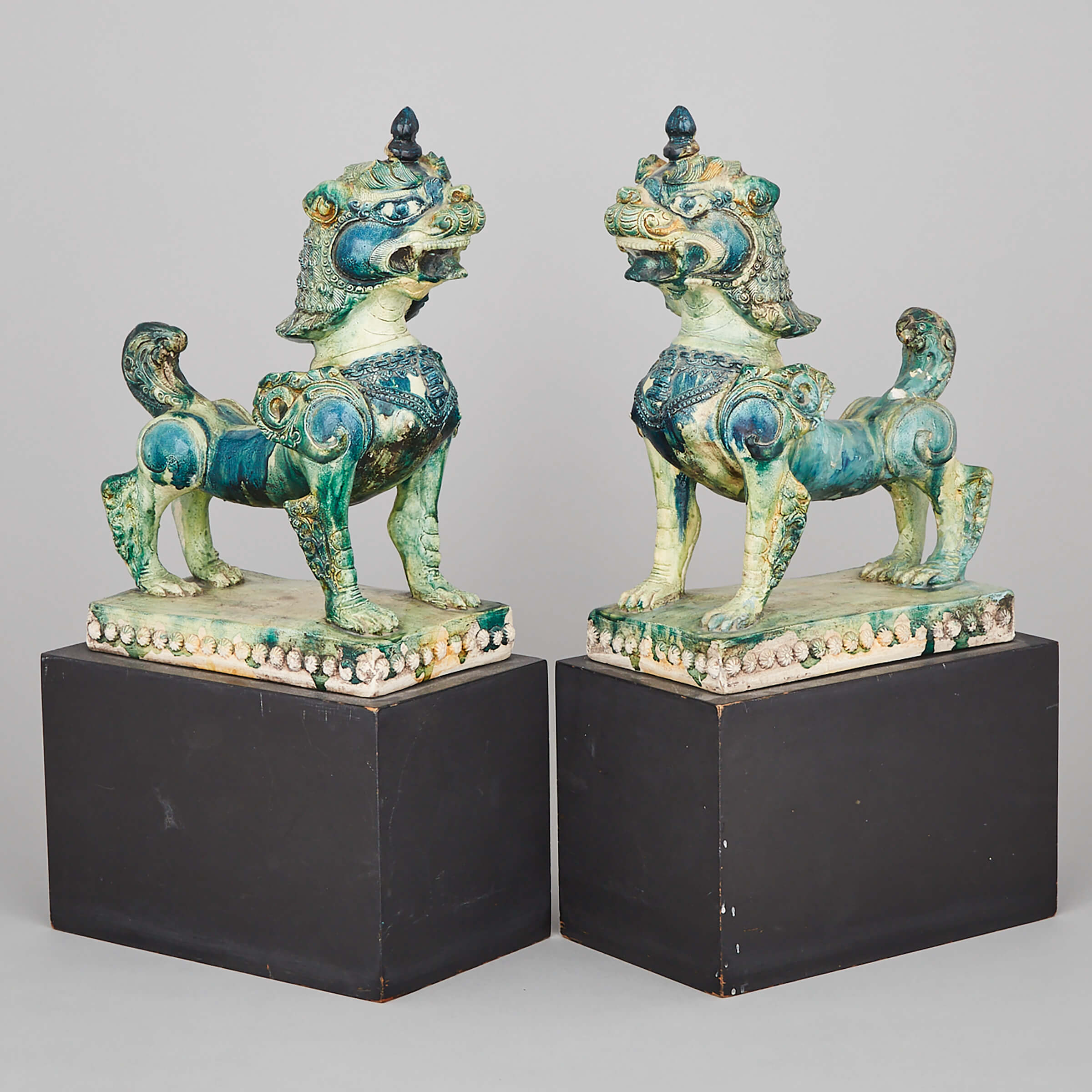 Pair of Southeast Asian Faience Pottery Guardian Lions, 20th century