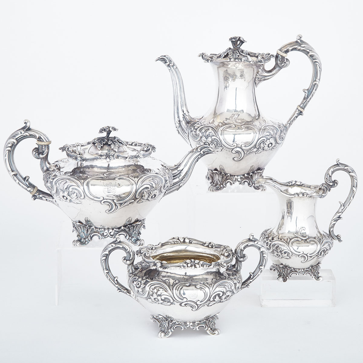 Early Victorian Silver Three-Piece Tea Service, Messrs. Barnard, London, 1836/37 and Matching Coffee Pot, William Comyns, London, 1914 