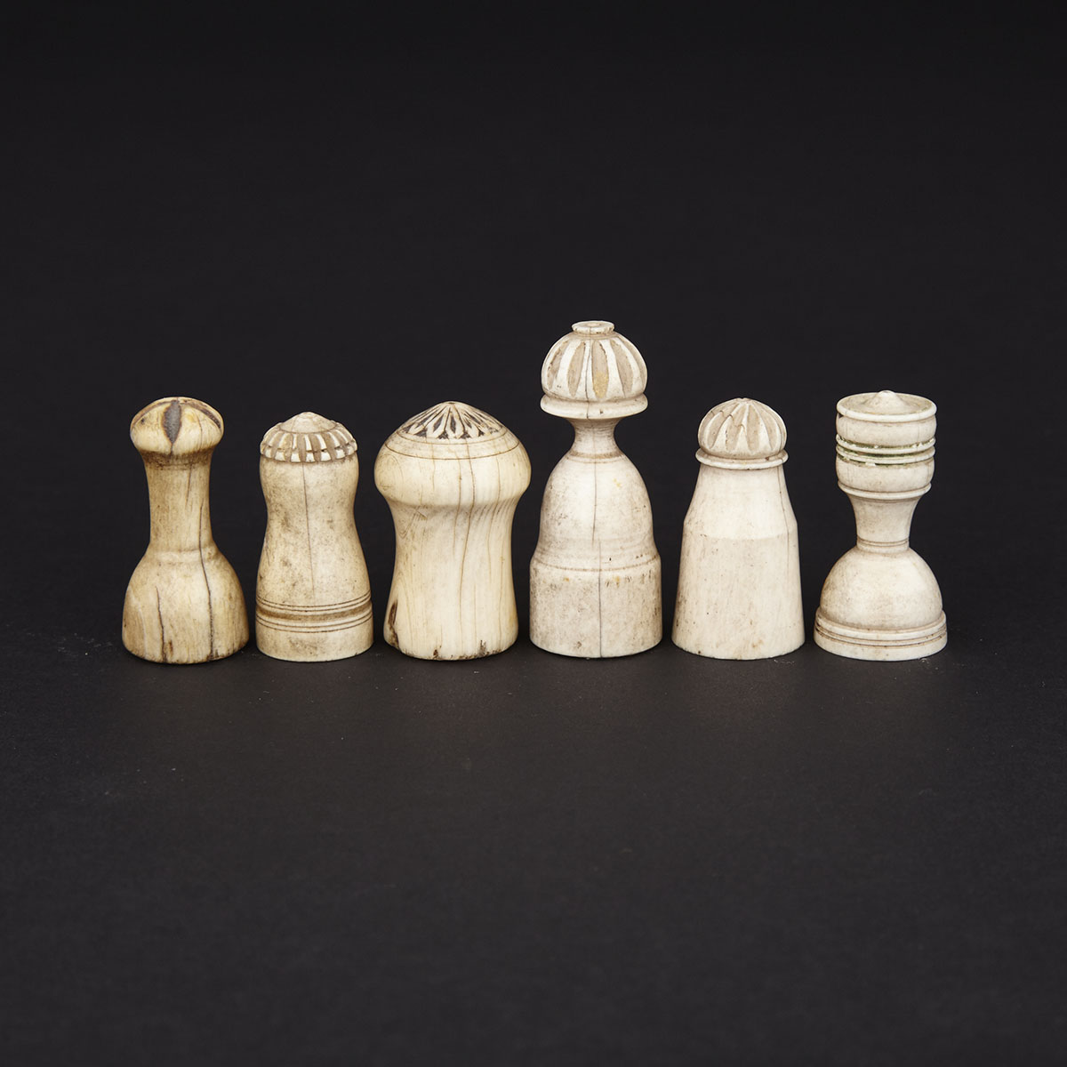 Group of Six Arab Islamic Ivory and Bone Chess Pieces, 18th century and earlier