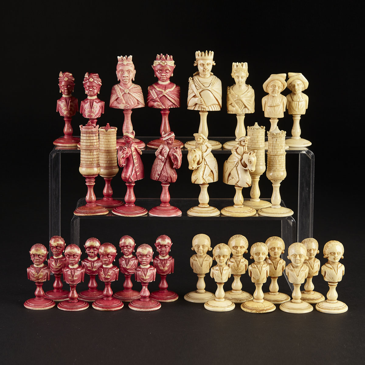 French Turned and Carved Ivory Assembled ‘Europe vs. Africa’ Chess Set, Dieppe, c.1790