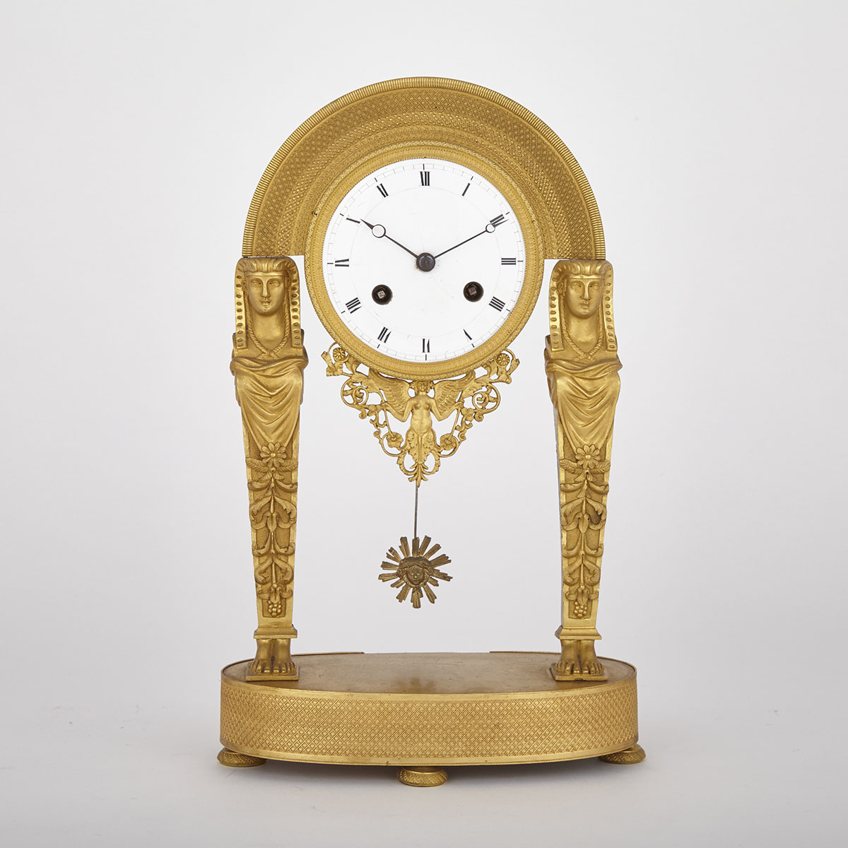 French Directoire Gilt Bronze Mantle Clock, late 18th/early 19th century