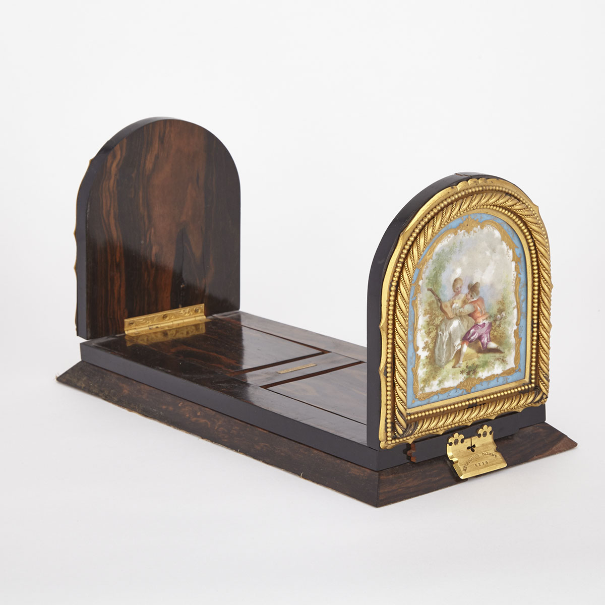 Victorian ‘Betjemann’s Patent’ Porcelain and Ormolu Mounted Coromandel Self Closing Book Slide, c.1880