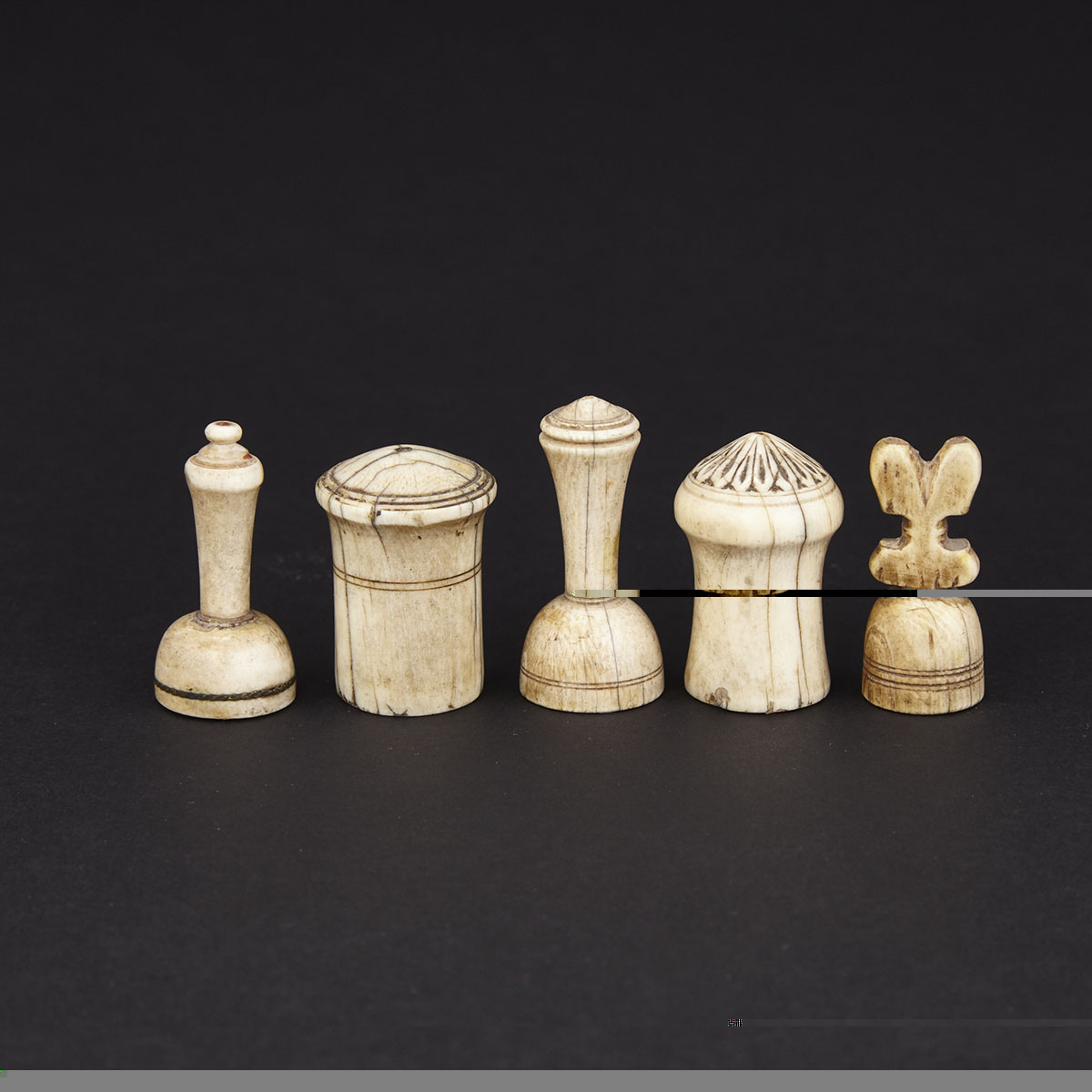 Group of Five Arab Islamic Ivory and Bone Chess Pieces, 18th century and earlier