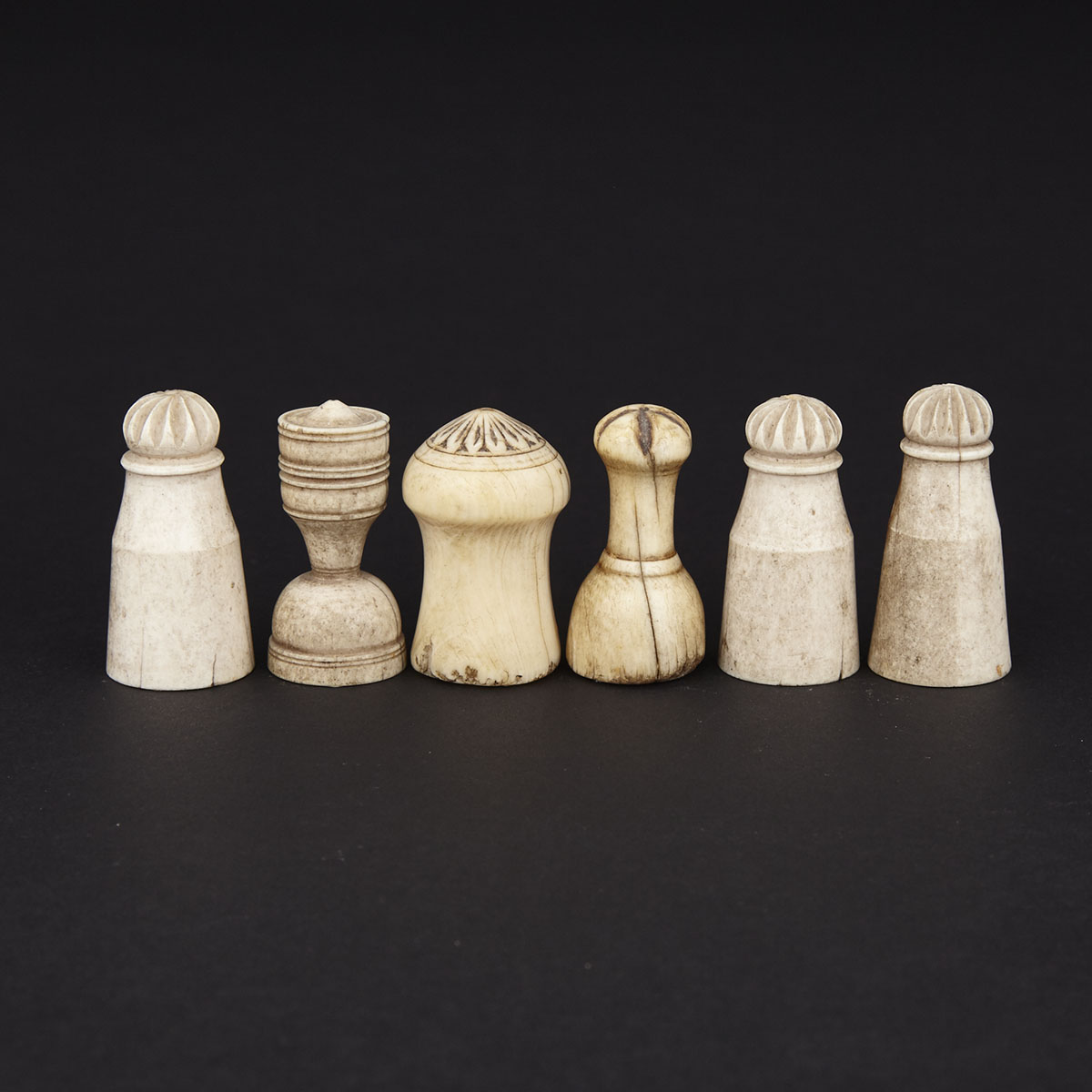 Group of Six Arab Islamic Ivory and Bone Chess Pieces, 18th century and earlier