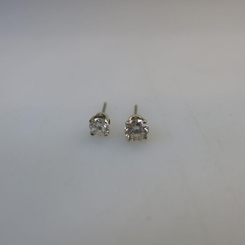 Two Single 14k Yellow Gold Stud Earrings
