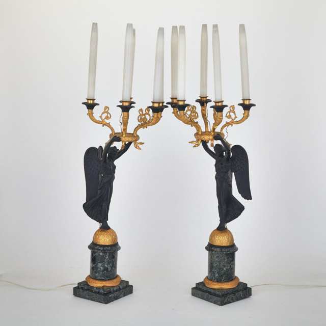 Pair of French Empire Style Gilt and Patinated Bronze Figural Candelabra, on Faux Marble Columns, 20th century