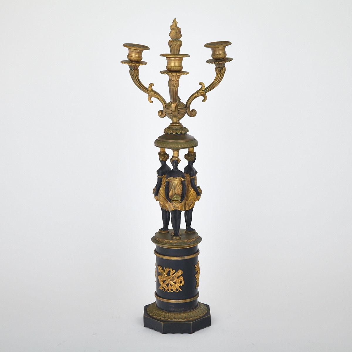 Austrian Empire Style Gilt and Patinated Bronze Figural Candelabrum, 19th/early 20th century