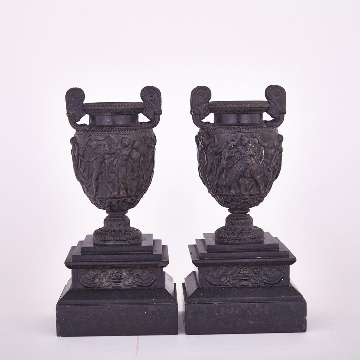Pair of French Patinated Bronze and Marble Urn Form Mantel Garnitures, 19th century