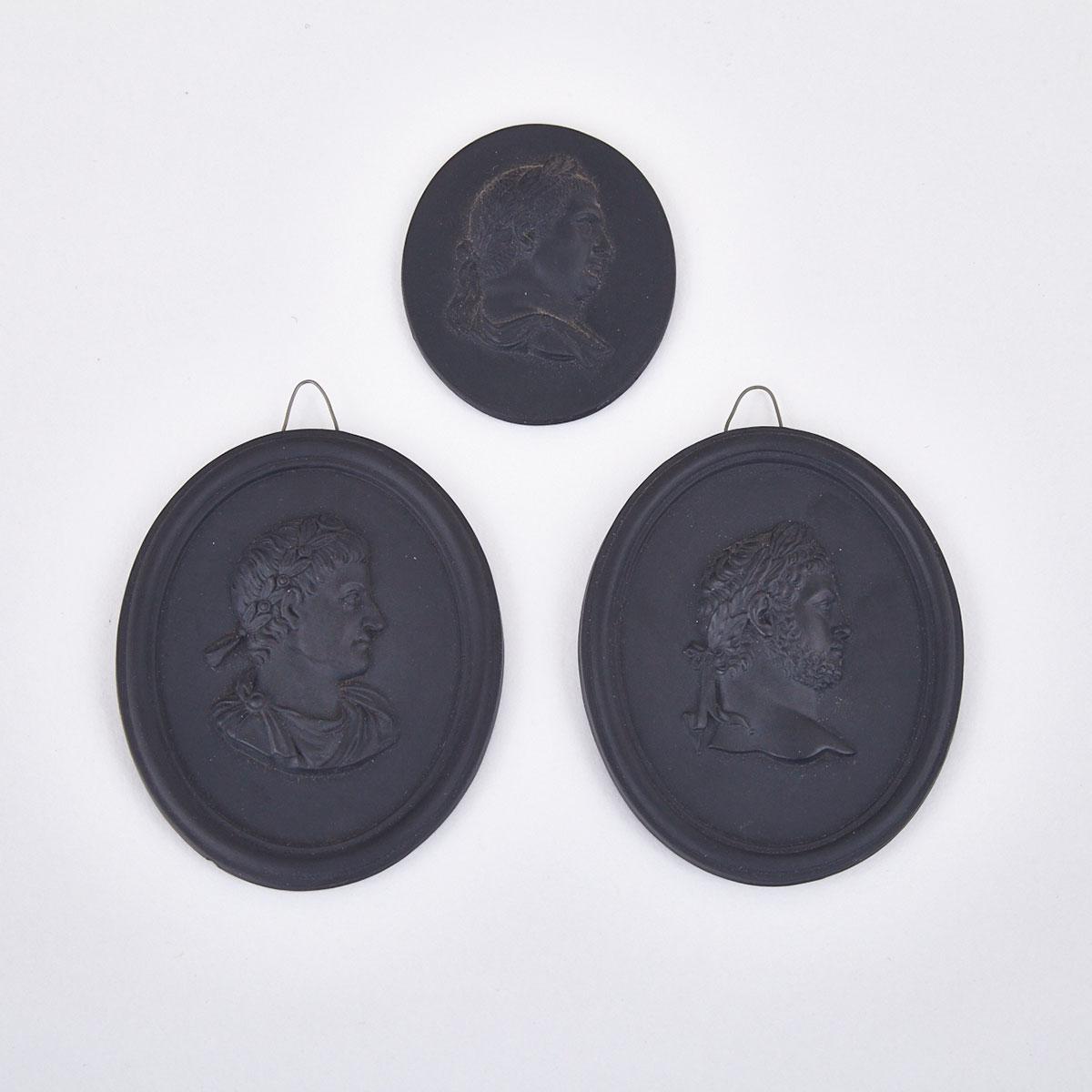 Three Wedgwood Black Basalt Oval Portrait Medallions of Roman Emperors, late 18th/19th century