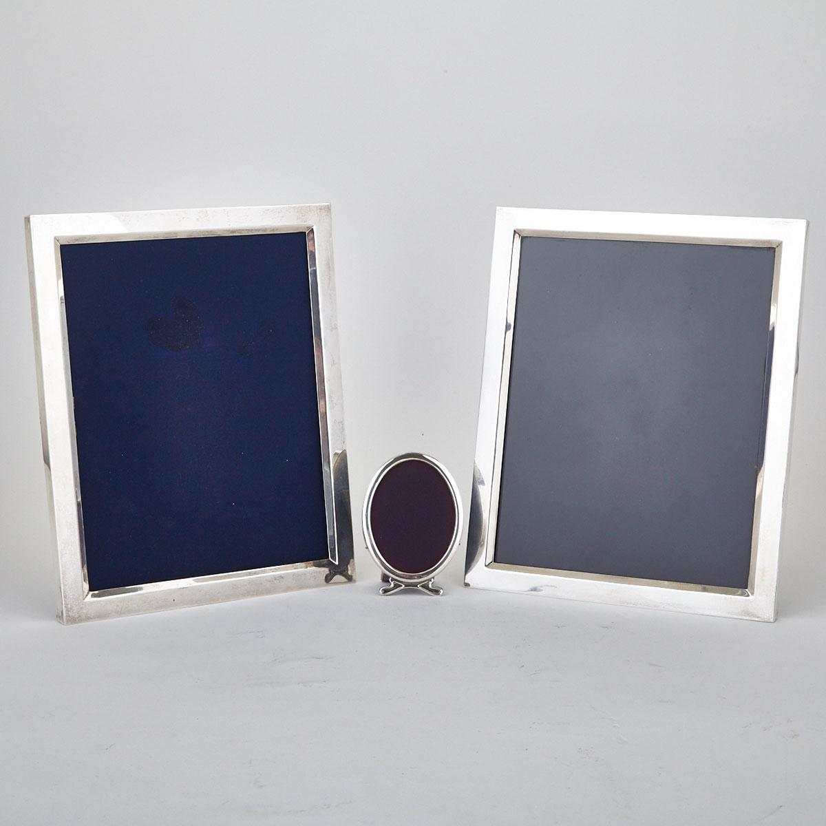 Pair of Canadian Silver Rectangular Photograph Frames and a Smaller Oval Frame, Henry Birks & Sons, Montreal, Que., 1960/62