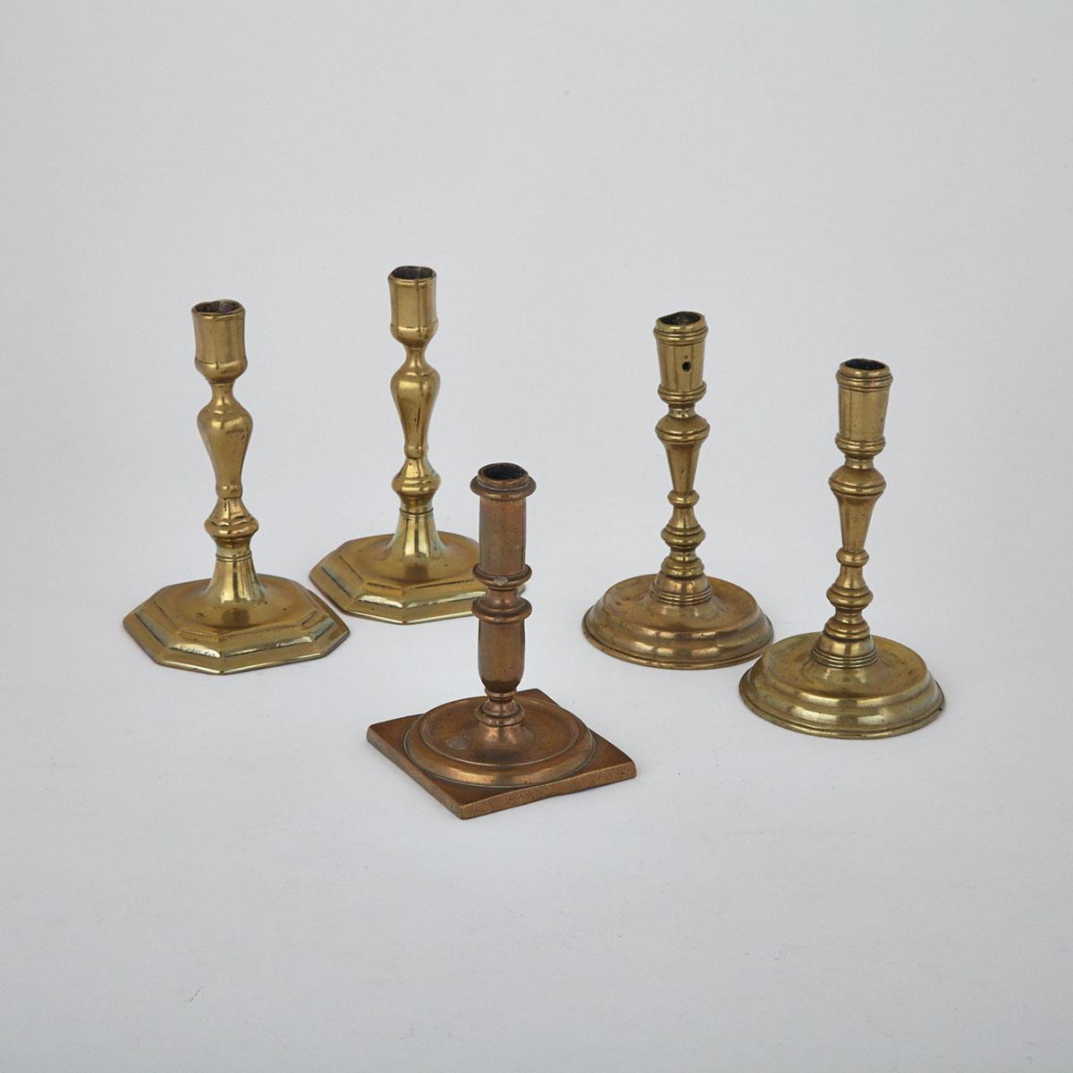 Group of Five Brass Candlesticks, early 18th century