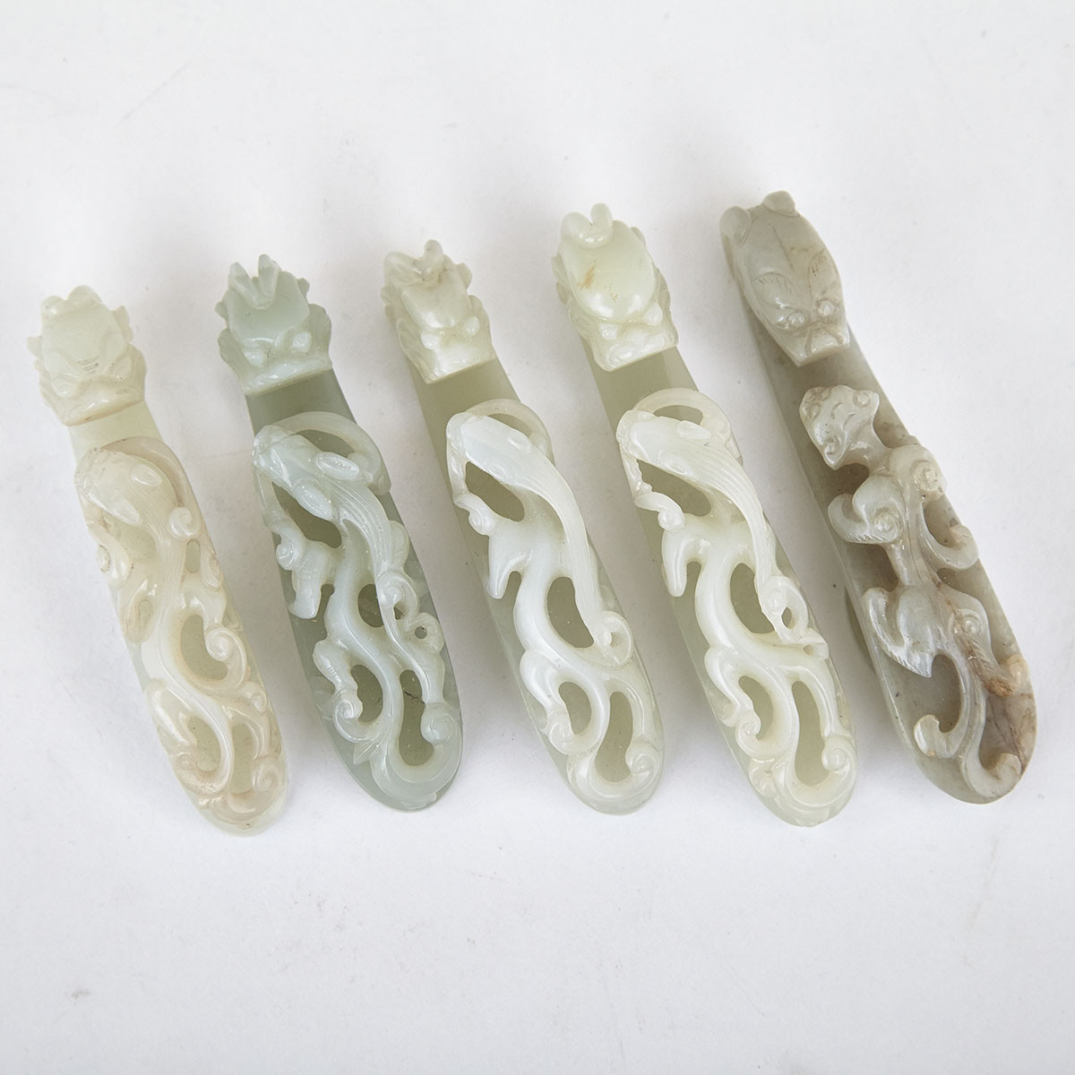 Five Pale Celadon Jade Belthooks, 18th/19th Century