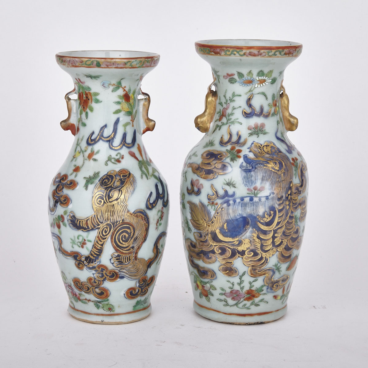 Pair of Export ‘Clobbered’ Famille Rose Baluster Vases, 19th Century