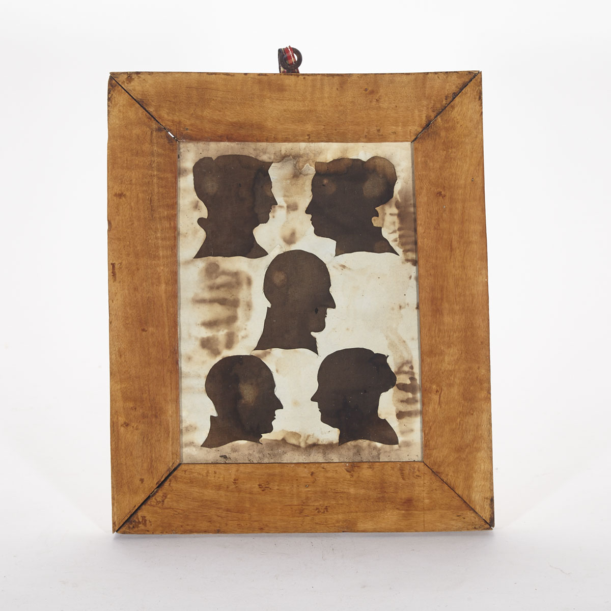 Linen Backed Paper Cutout Silhouettes of a Family Group, mid 19th century