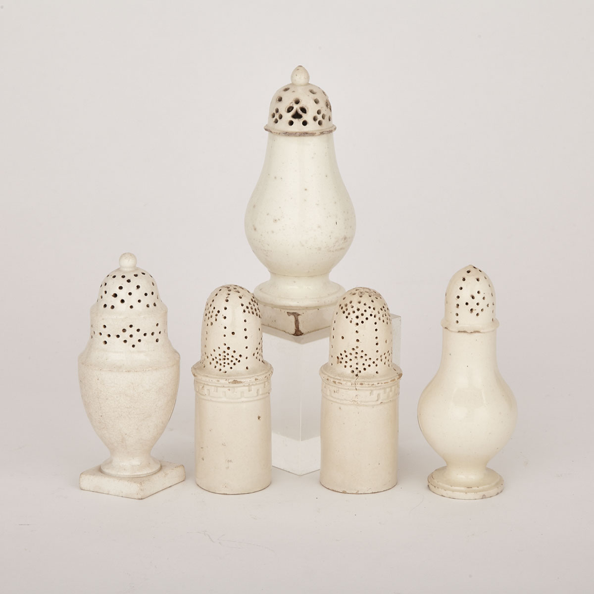 Collection of Five English Leeds Creamware Pottery Sugar Casters, late 18th century