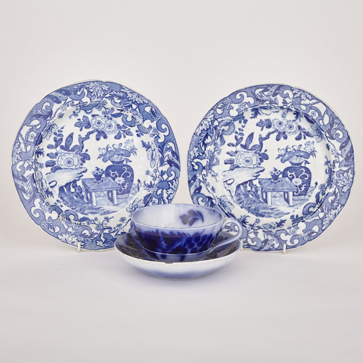 Pair of Mason’s Chinoiserie Blue and White Transfer Printed Plates and a ’Flow Blue’ Cup and Saucer, c.1825