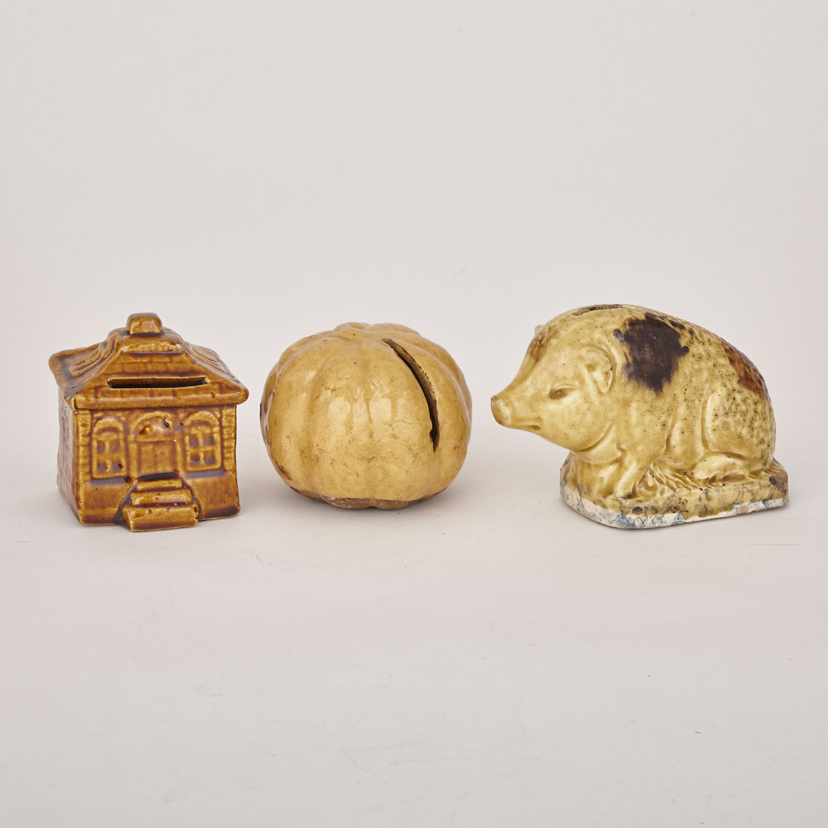 Three Pottery Coin Banks, 19th century