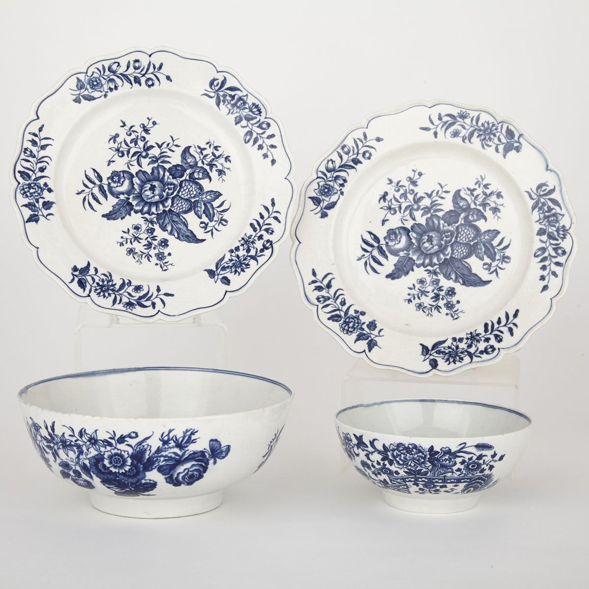 Worcester ‘Three Flowers’ Bowl, ‘Fence’ Pattern Bowl and Two ‘Pine Cone’ Pattern Plates, c.1770-85