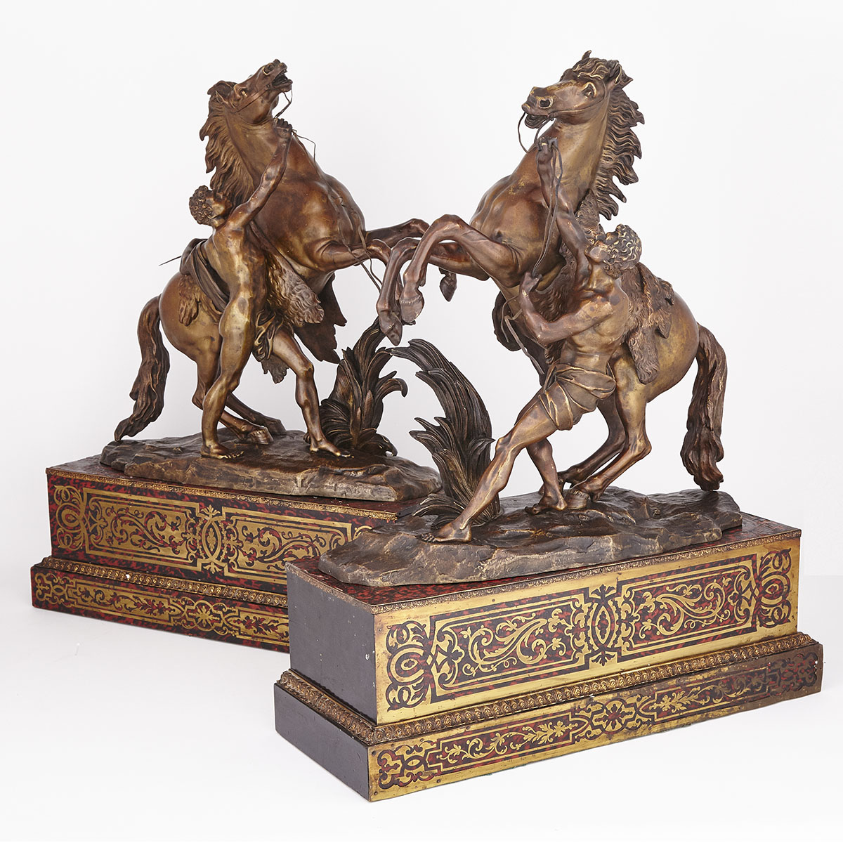 Pair of Patinated Bronze Models of The Marly Horses on Boulle work plinths, 19th century