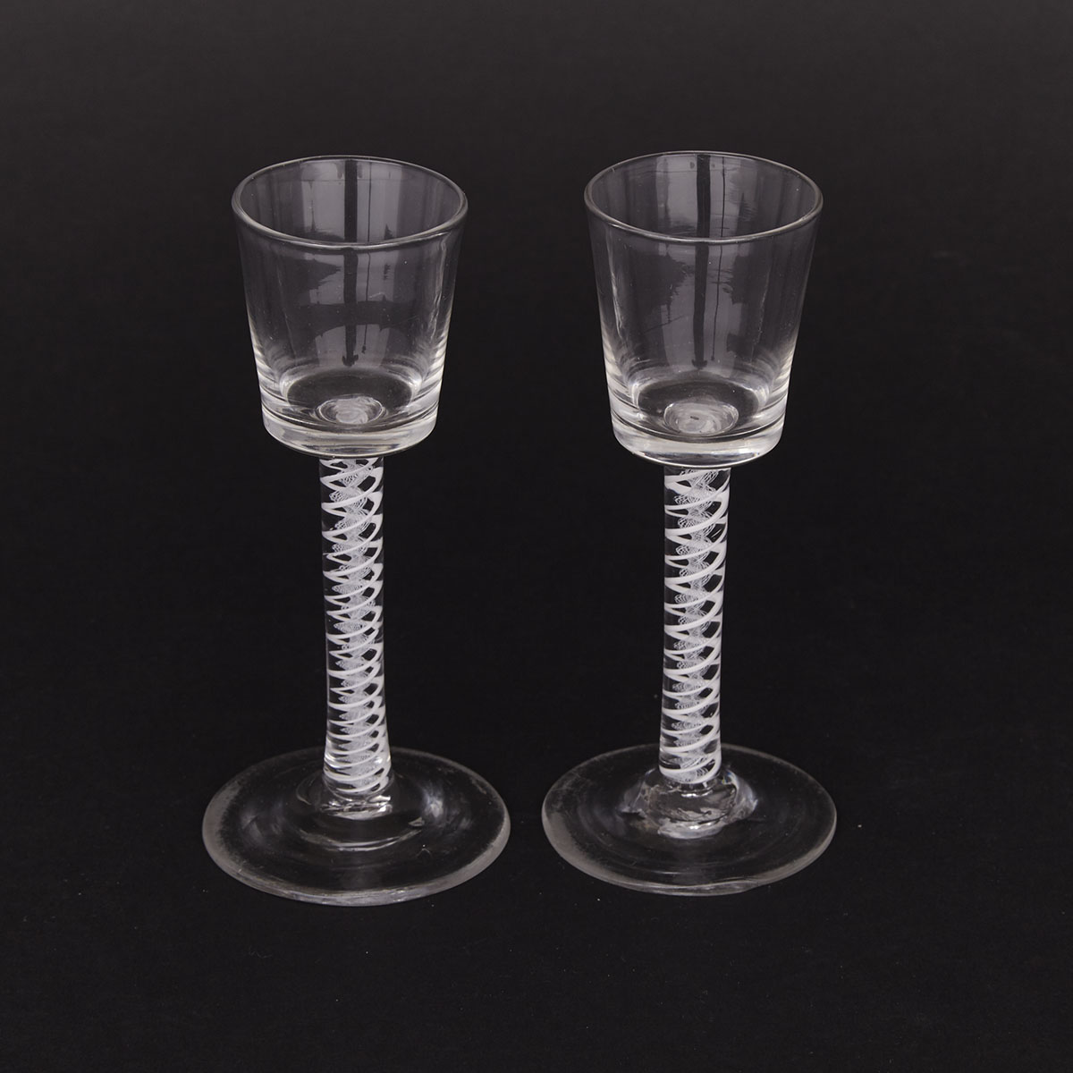 Pair of English Opaque Twist Stemmed Wine Glasses, 18th century