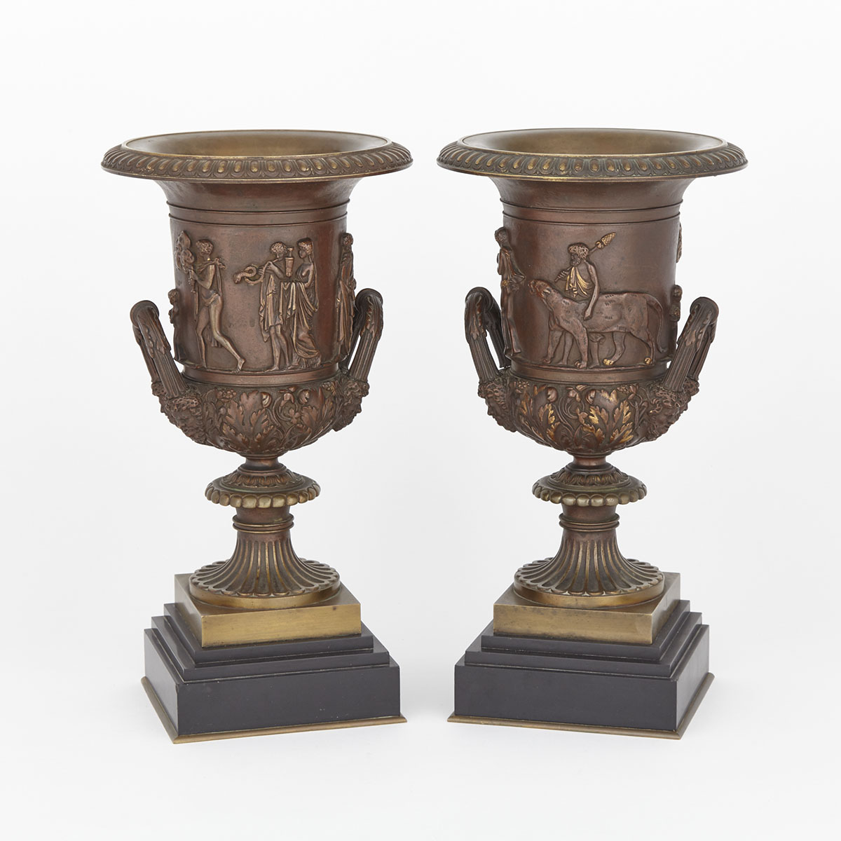 Large Pair of French Neoclassical Patinated and Parcel Gilt Bronze Urns, After the Antique, 19th century