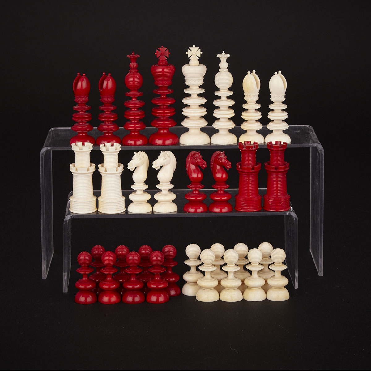 English Turned and Carved Ivory ‘Lund Pattern’ Chess Set, early 20th century