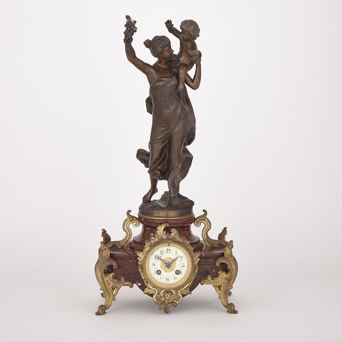 Napoleon III Patinated White Metal and Ormolu Mounted Rouge Griotte Marble Figural Mantel Clock, c.1890
