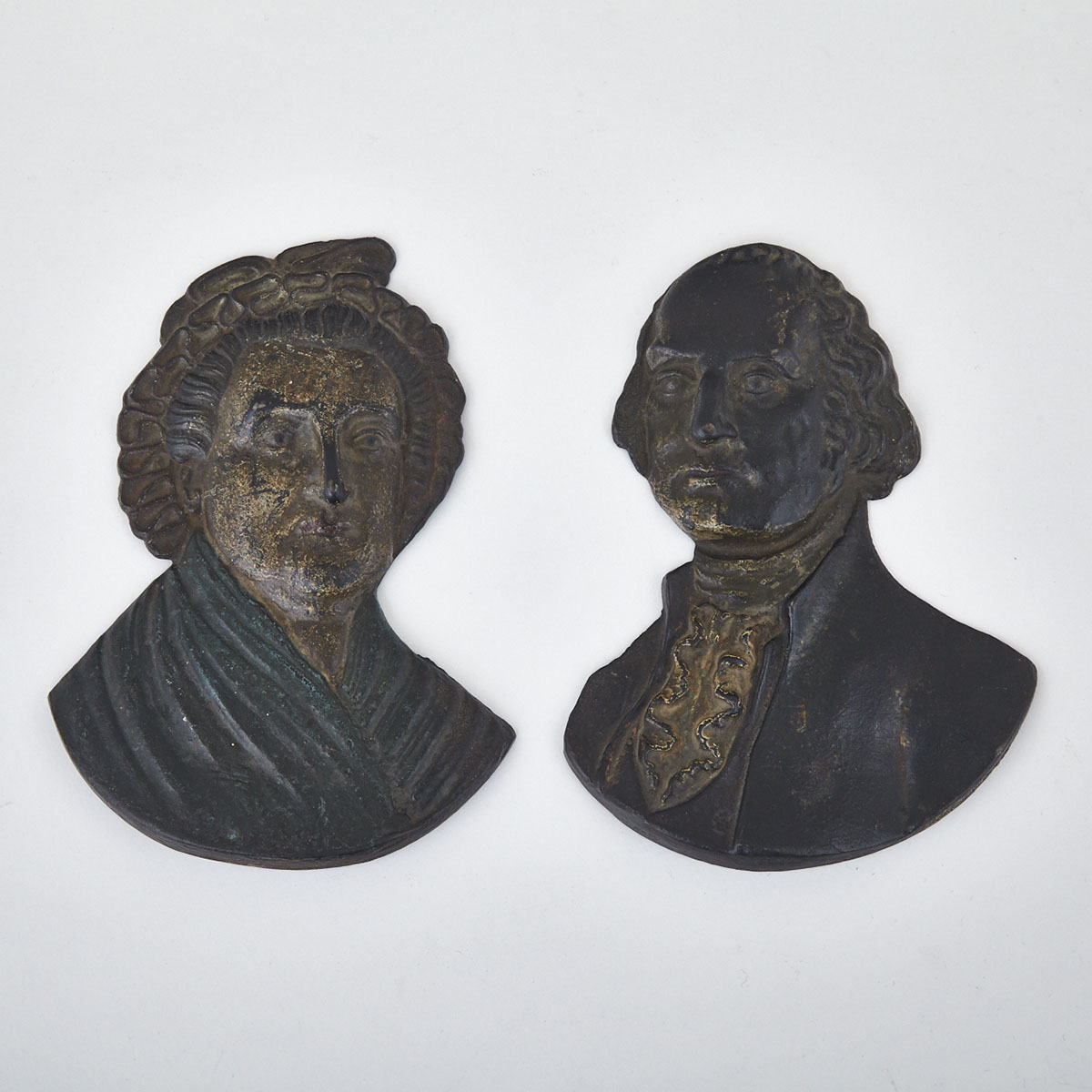 Pair of Polychromed Cast Iron Relief Portrait Plaques of George and Martha Washington, 19th/early 20th century