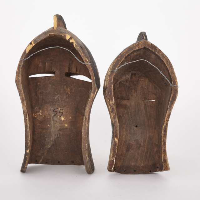 Two Songye Kifwebe Carved and Painted Wood Masks, Central Africa, 20th century