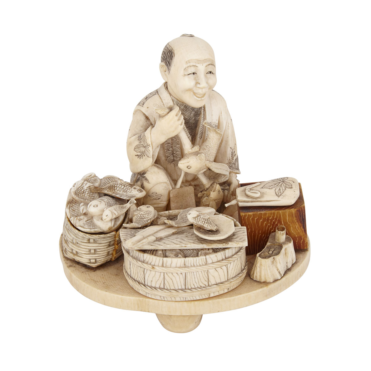 An Okimono of a Seated Fisherman, Meiji Period