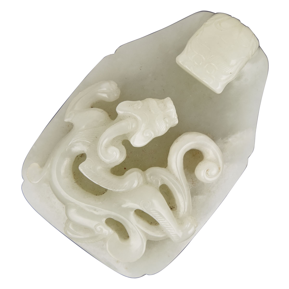 A Finely Carved Pale Celadon Jade Belt Hook, Qing Dynasty, 18th/19th Century