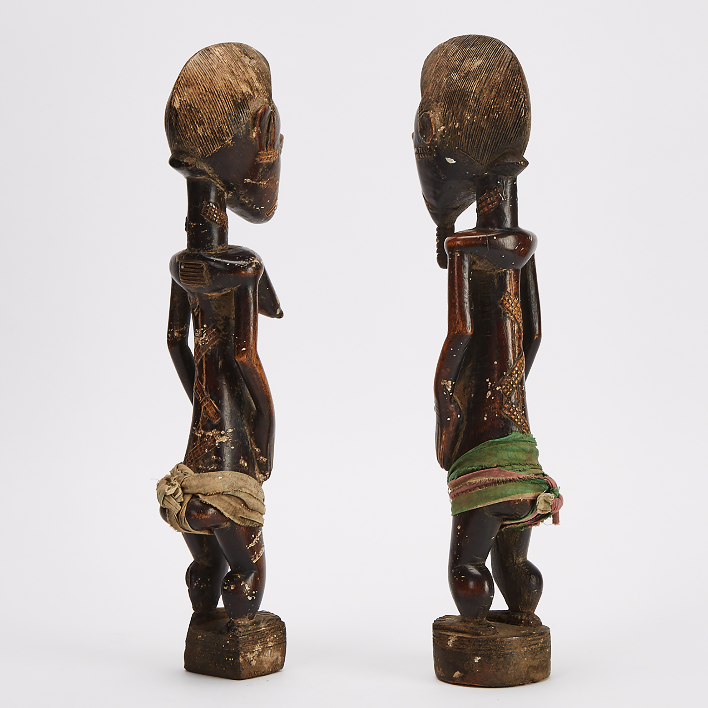 A Pair of Baule Male and Female Ancestral Figures, Ivory Coast, West Africa