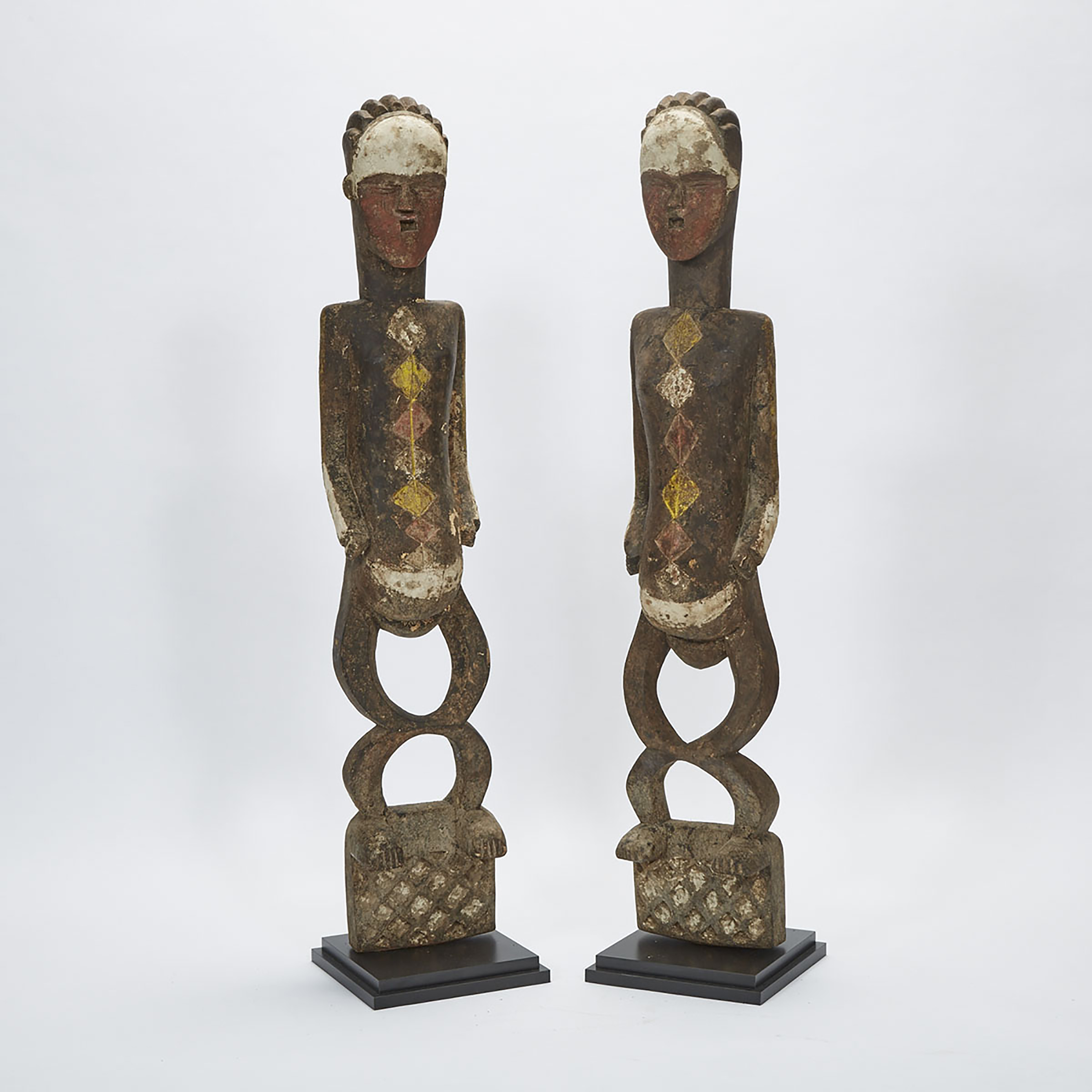 A Pair of Tsogho/ Vuvi Female Shrine Figures, Gabon, Central Africa