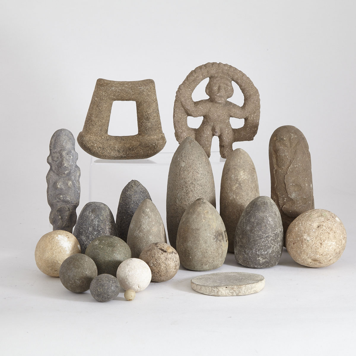 Large Group of Stone Sculptures and Tools
