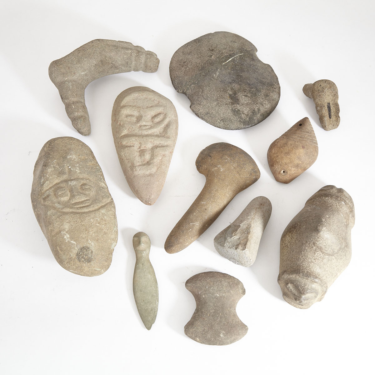 Group of Eleven Stone Sculptures and Tools