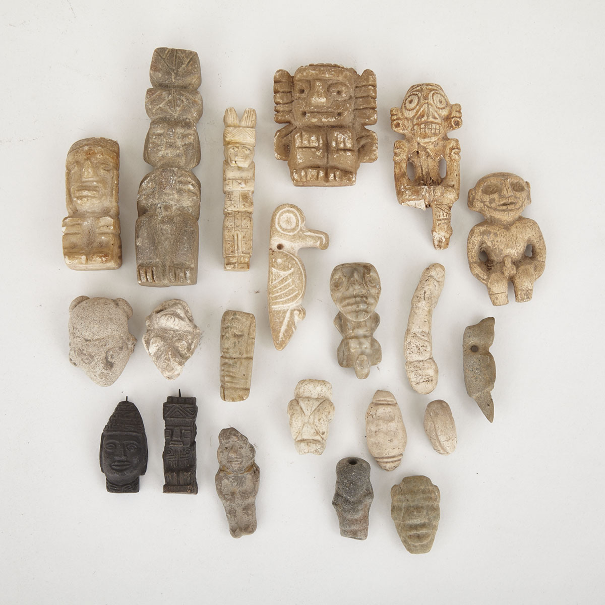Group of Pottery and Bone Amulets and Figures
