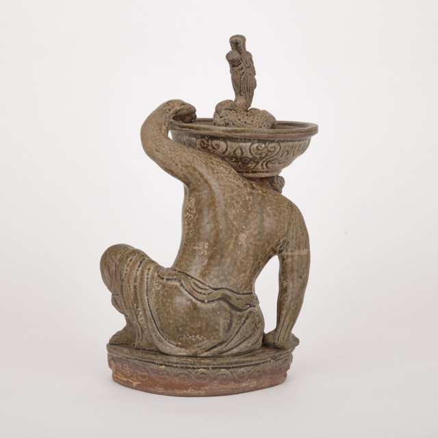 Yaozhou Glazed Figural Huren Candlestick