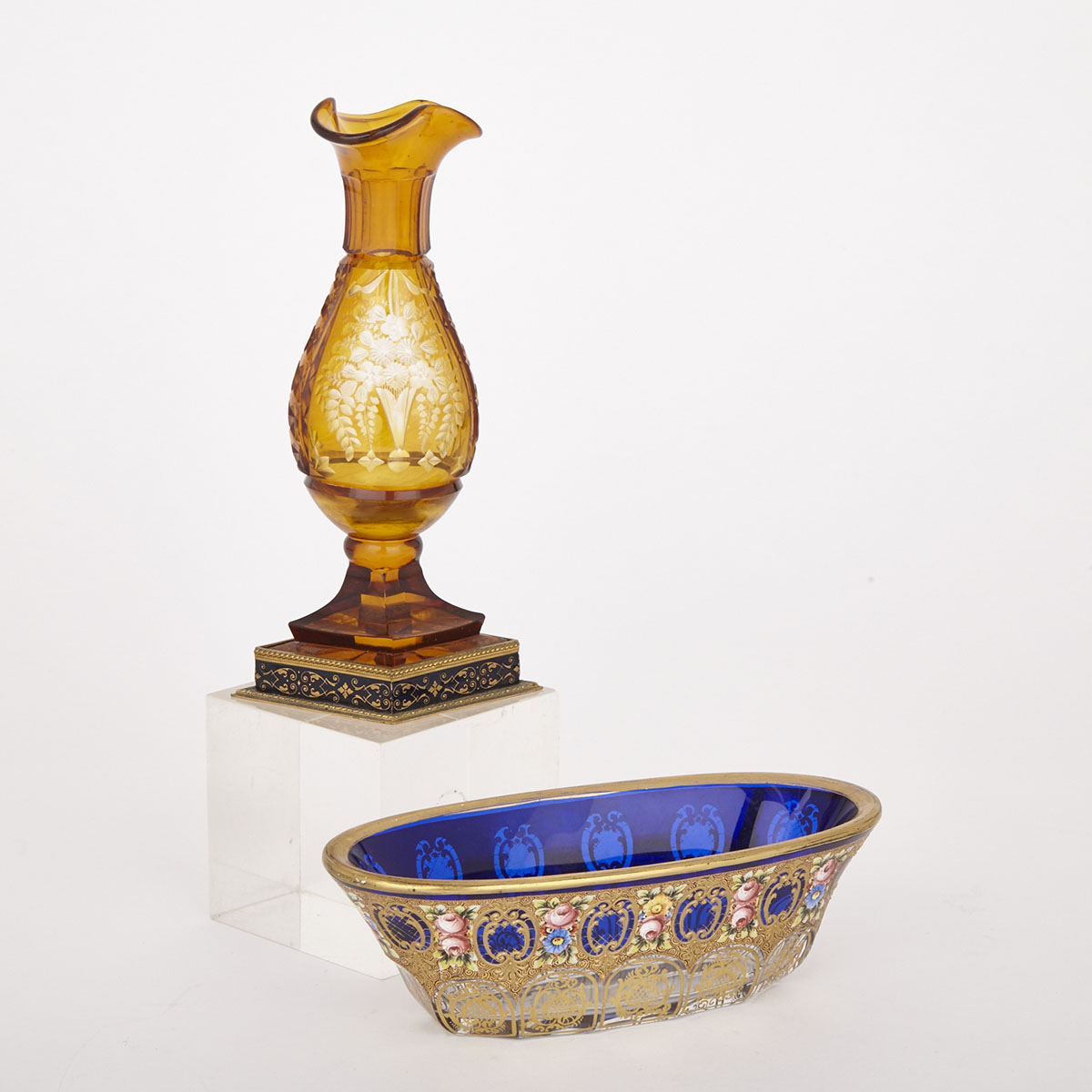 Bohemian Blue Overlaid Gilt and Enameled Oval Bowl and an Amber Overlaid Cut Glass Vase, late 19th/early 20th century