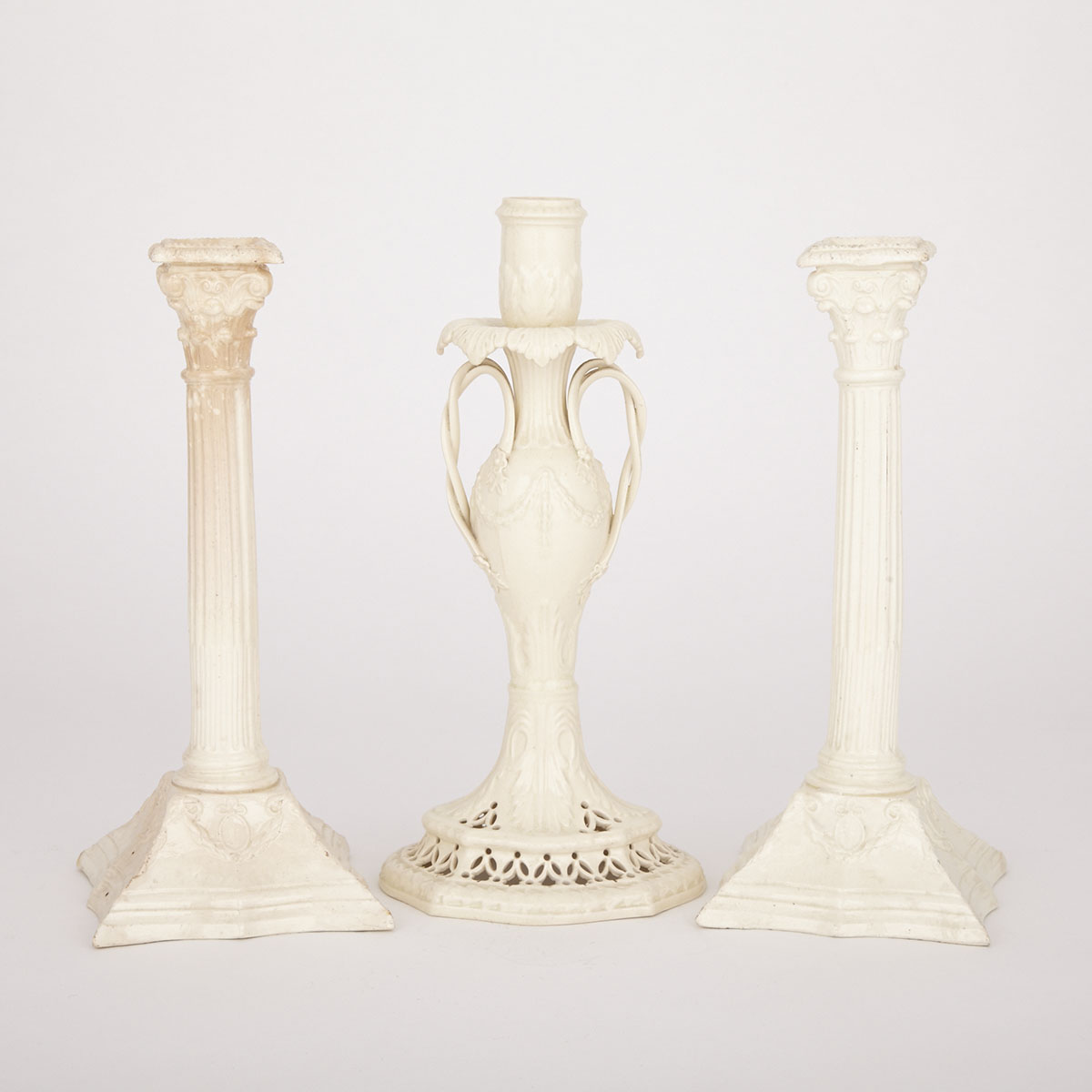 Three English Creamware Candlesticks, late 18th/19th century