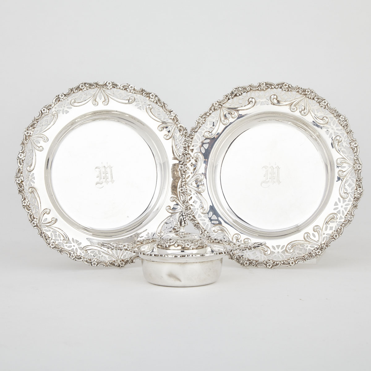 Pair of Canadian Silver Pierced Small Plates and a Covered Two-Handled Bowl, Henry Birks & Sons, Montreal, Que., 20th century