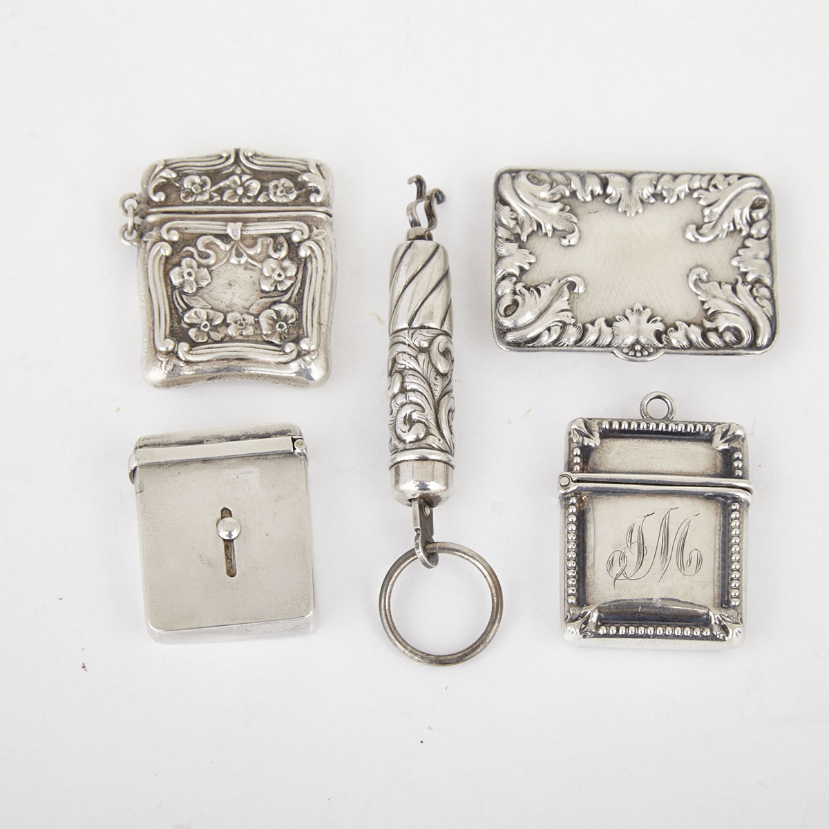 Four American Silver Stamp Cases and a Letter Scale, c.1900