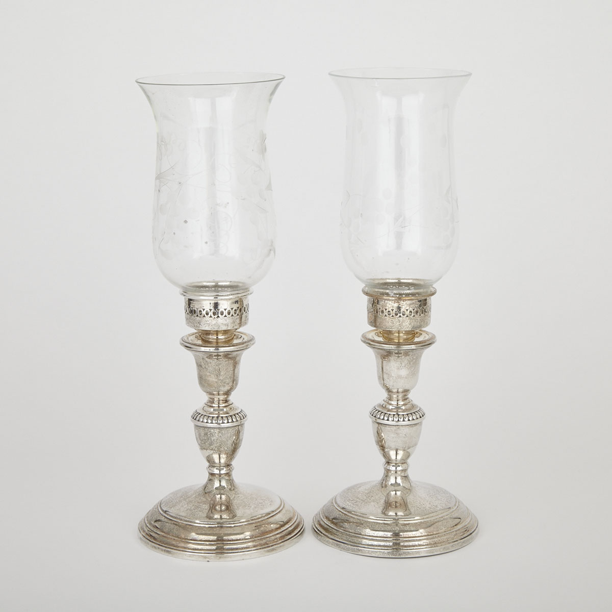 Pair of Canadian Silver Candlesticks, Henry Birks & Sons, Montreal, Que., 20th century