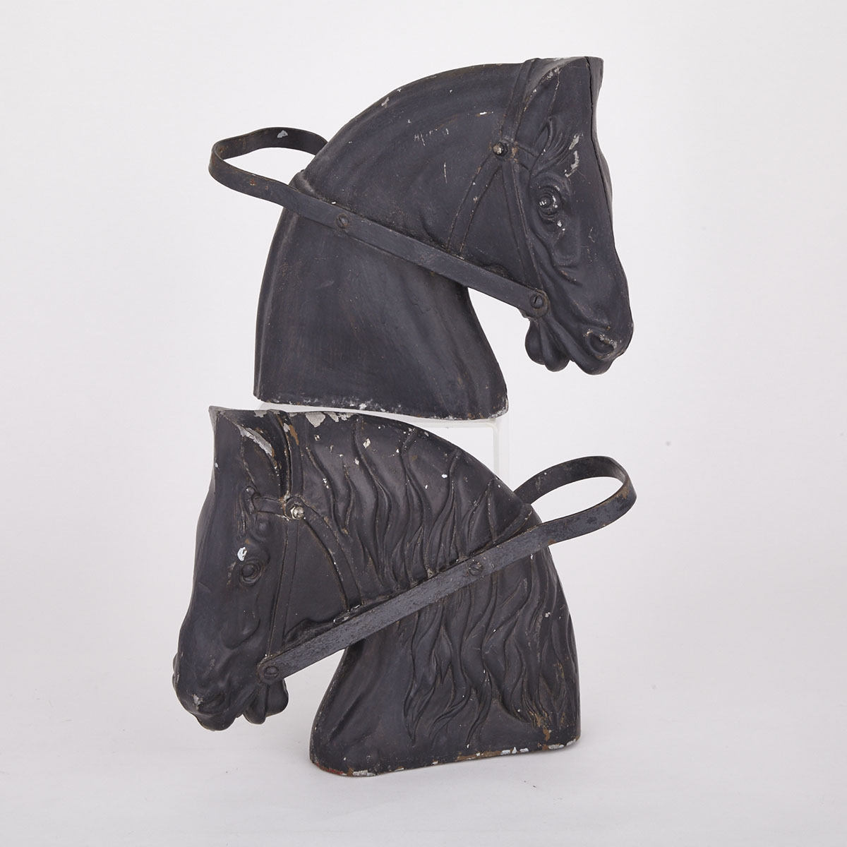 Two Painted White Metal Carousel Horse Heads, c.1900