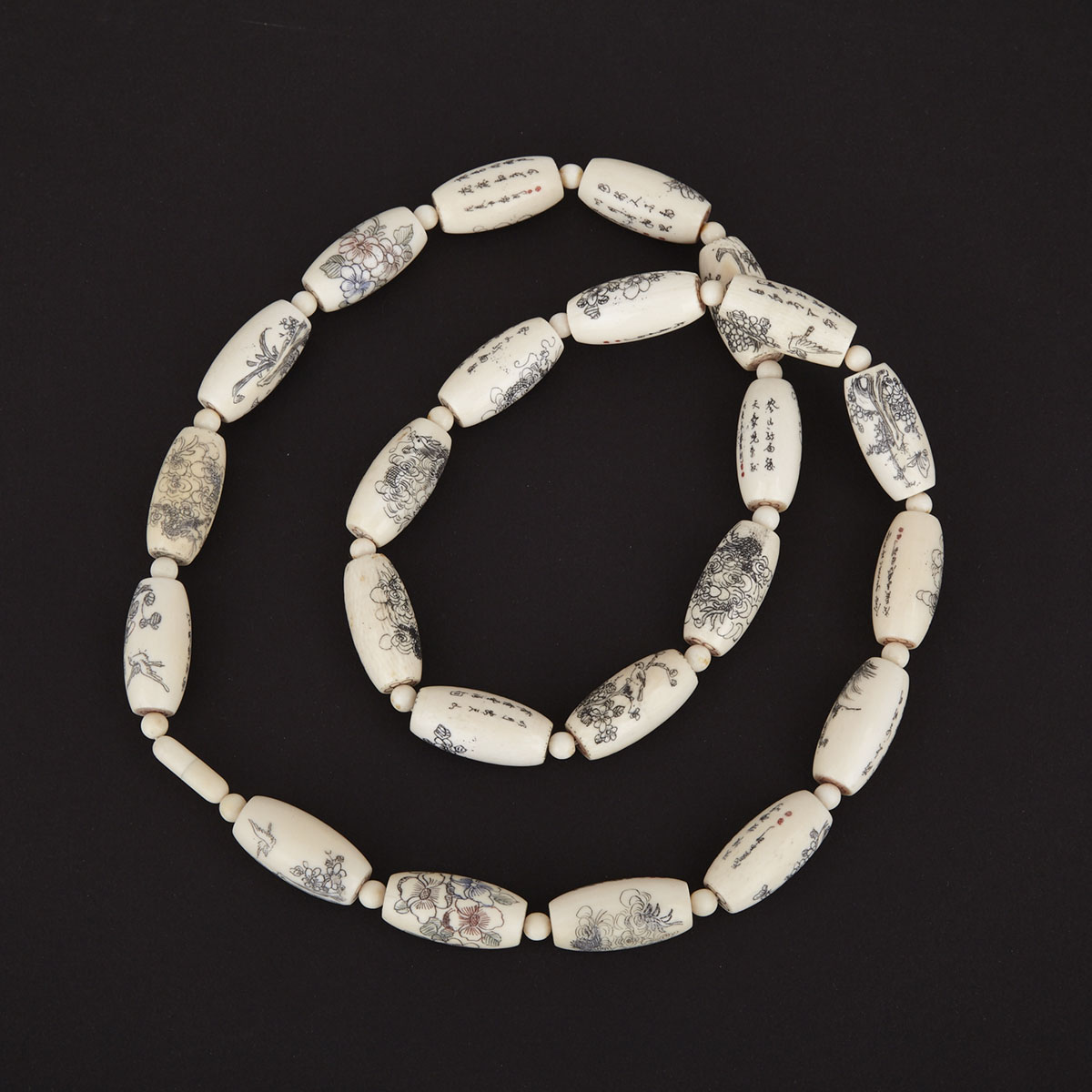 Strand of Carved Ivory Beads, Circa 1940