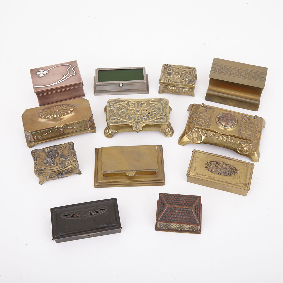 Collection of 12 Mostly Art Nouveau Metal Stamp Boxes, 19th/early 20th century