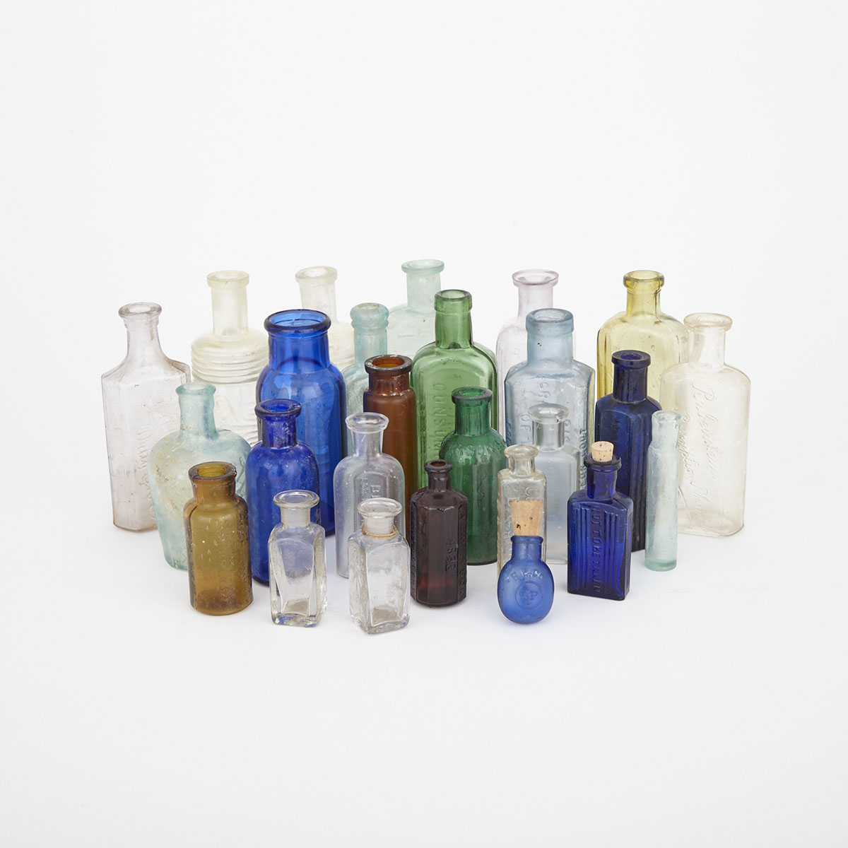 Miscellaneous Group of 26 Glass Medicine Bottles, 19th/early 20th century